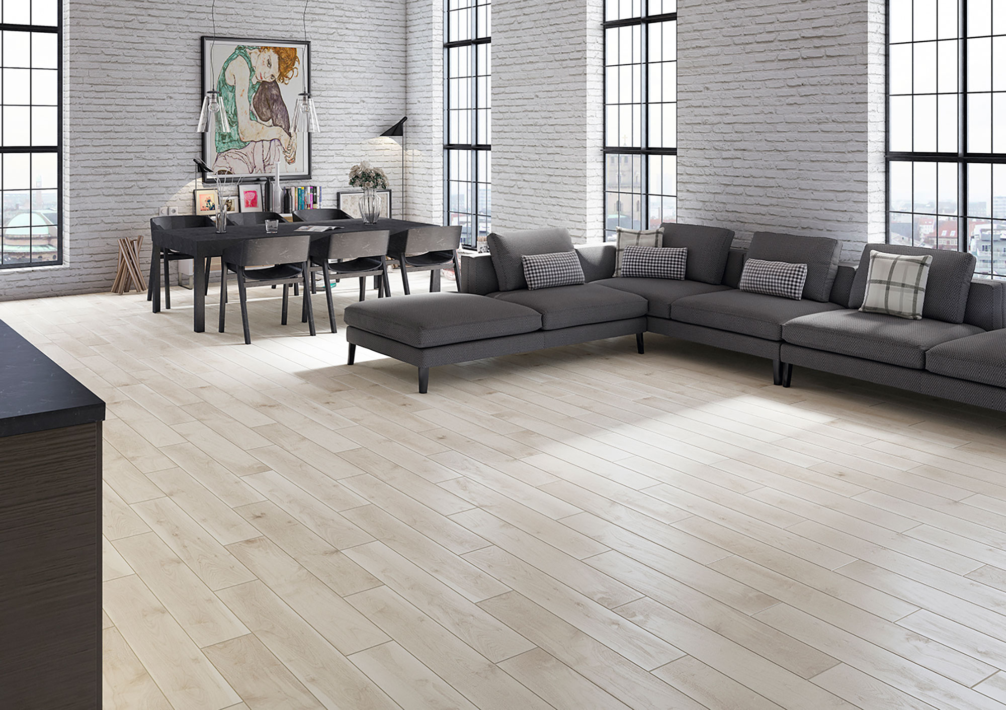 Salón con pavimento cerámico imitación madera claro, sofá gris y pared de ladrillo blanco