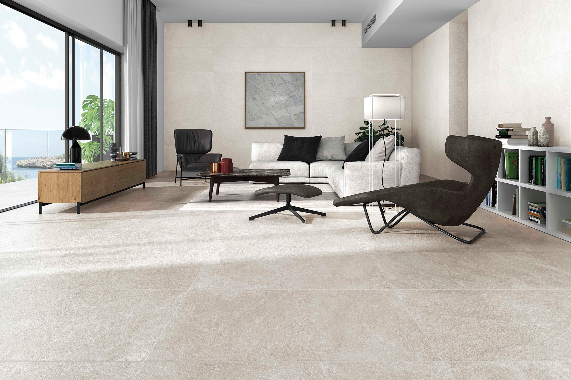 Salón de exposición con pavimento y revestimiento cerámico beige efecto piedra