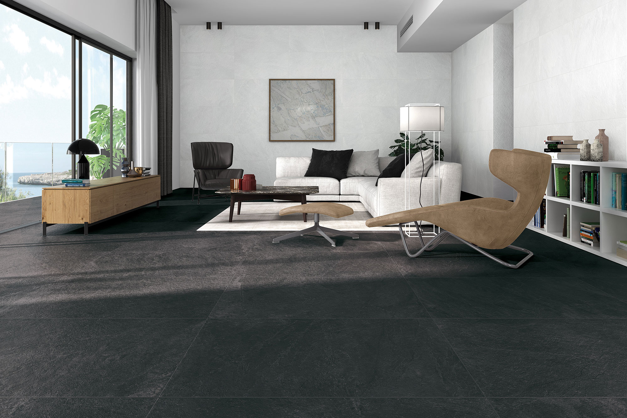 Sala moderna con pavimento cerámico negro efecto pizarra y paredes revestidas claras.