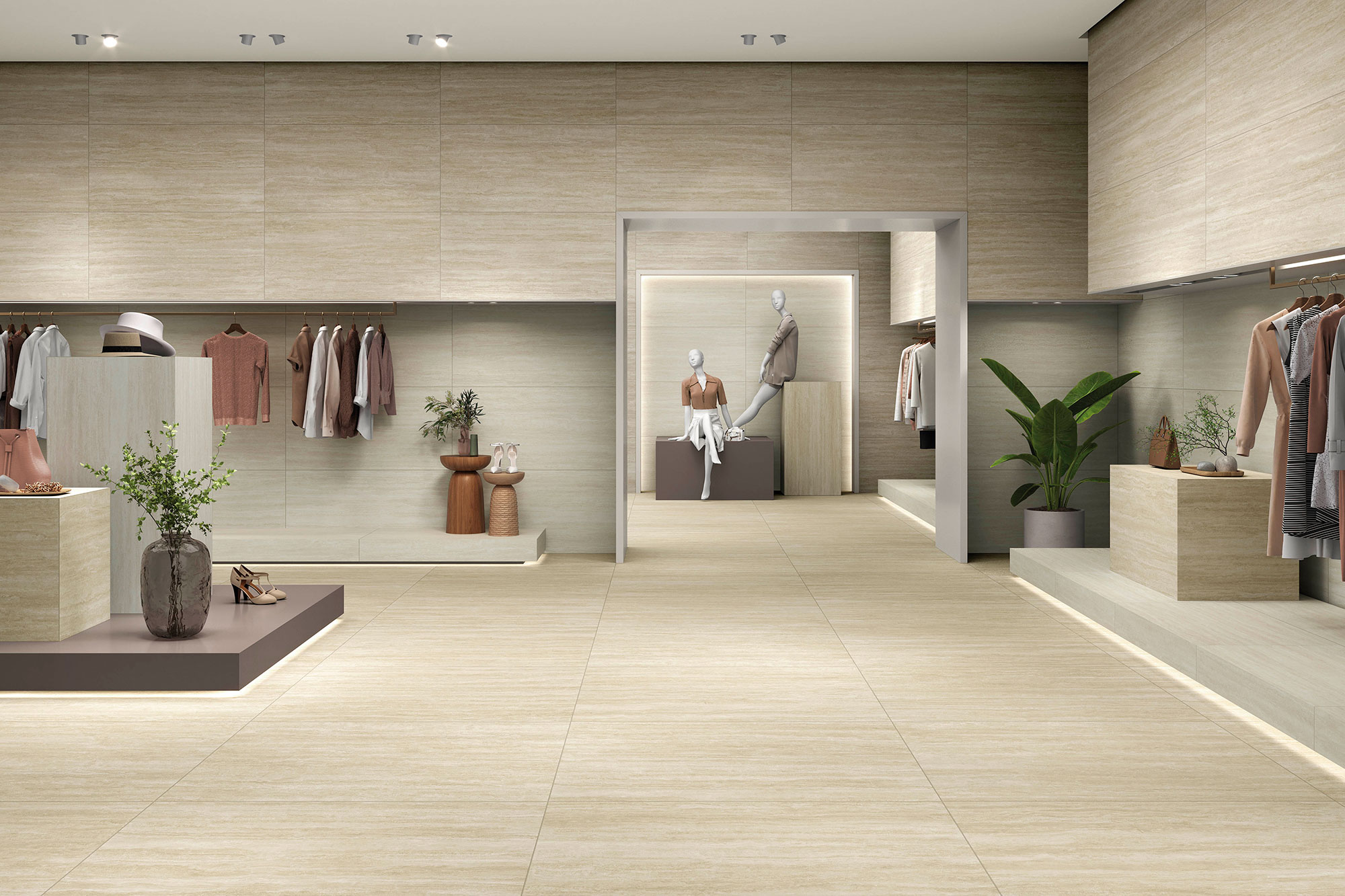 AMB_STN-FORTUNE-IVORY_NATURAL-60X120-MT Tienda elegante con pavimento y revestimiento cerámico claro, maniquíes y prendas