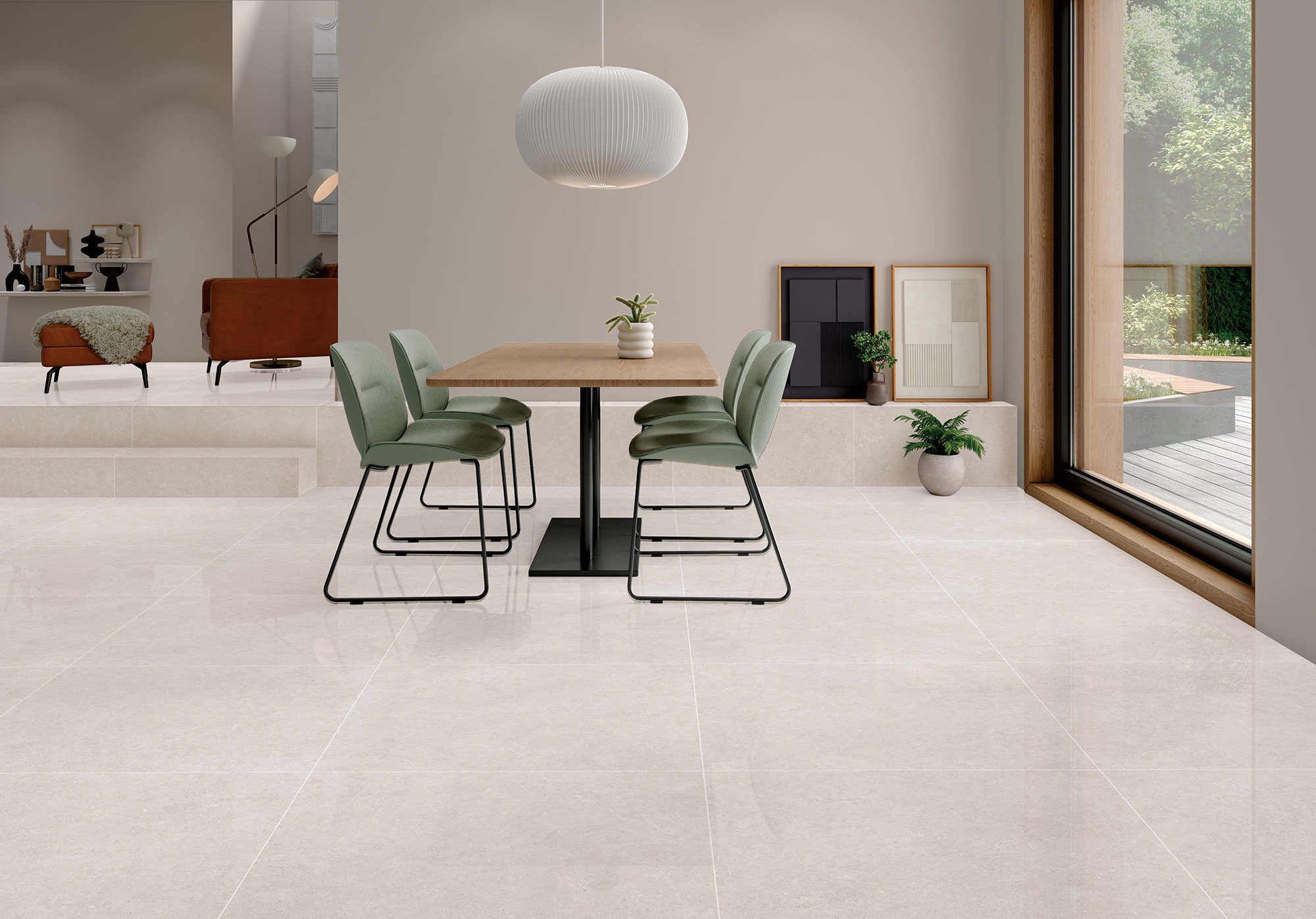 Comedor moderno sobre pavimento cerámico beige pulido, mesa madera, sillas verdes