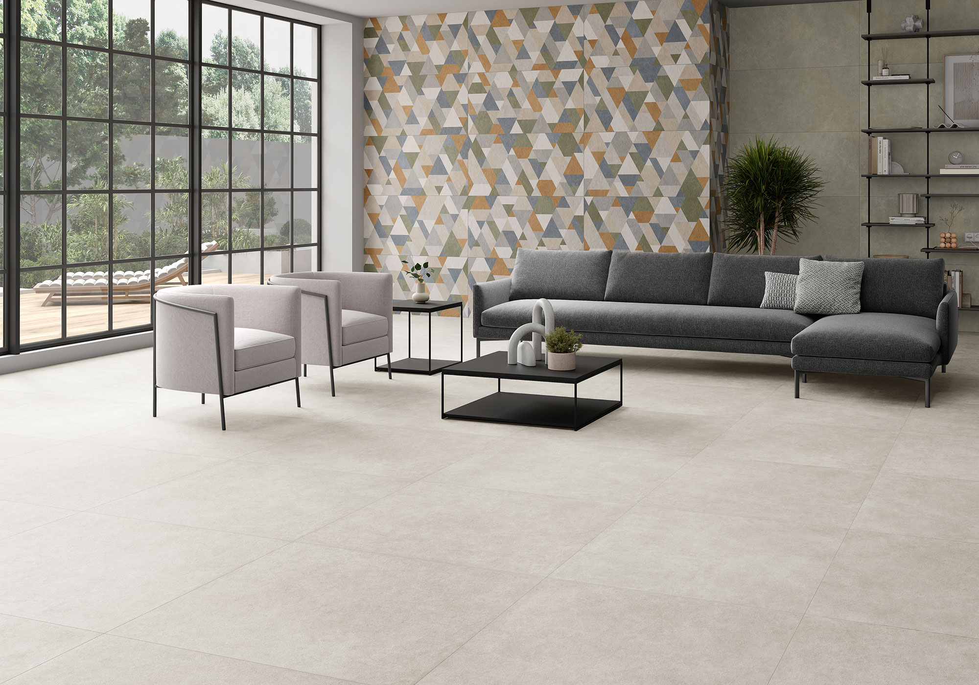 Sala moderna con pavimento cerámico claro y pared de azulejos geométricos multicolor