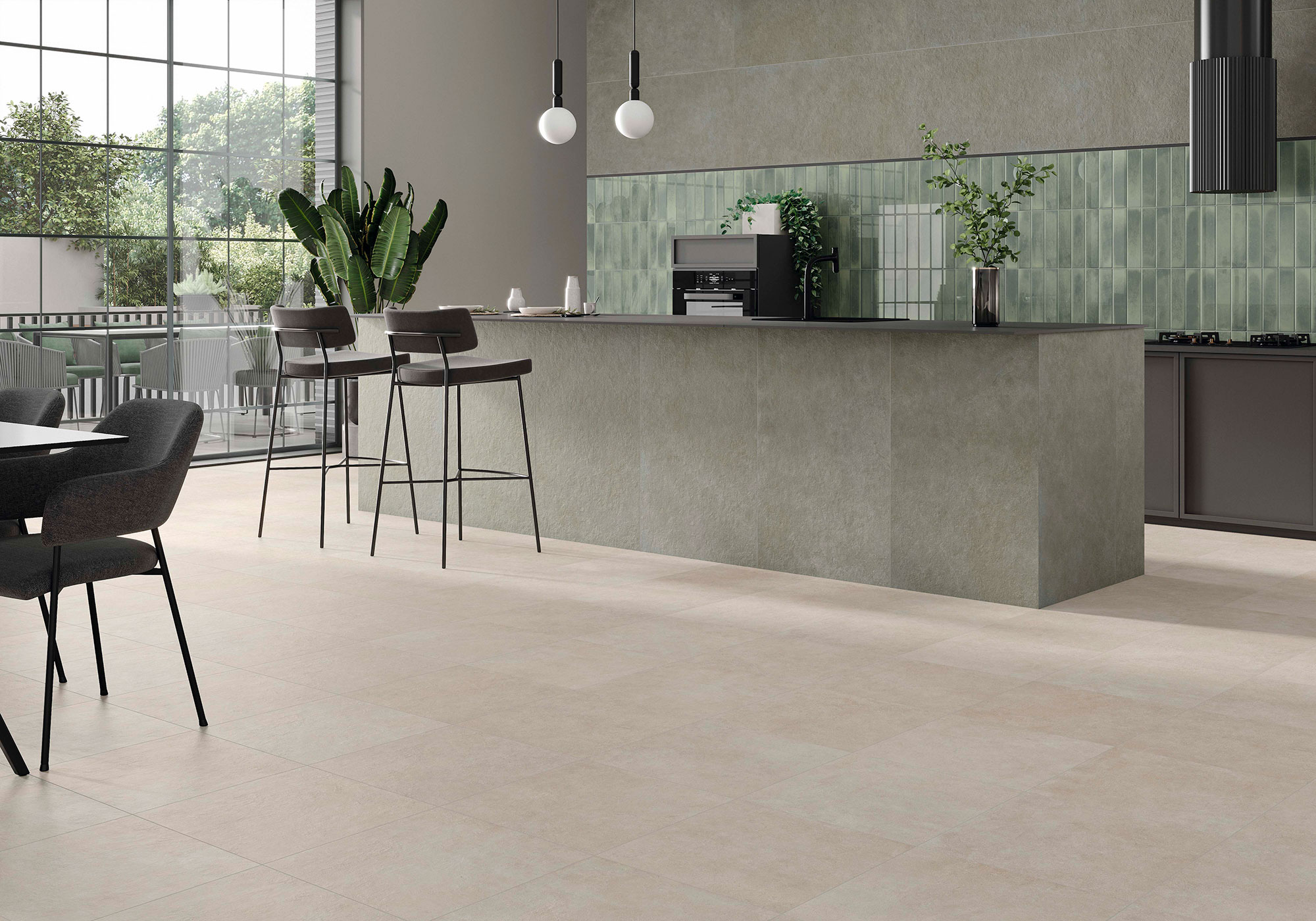 Showroom con suelo cerámico claro, isla revestida gris y azulejo mural verde