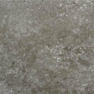 Azulejo cerámico gris efecto hormigón con textura envejecida y motas blancas