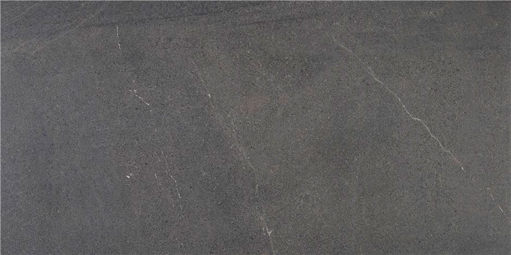 Bellevue-graphite-30x60 Baldosa cerámica gris oscuro efecto pizarra con sutiles vetas claras