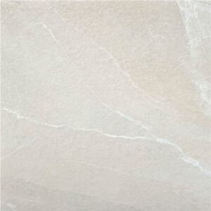 Azulejo cerámico beige con vetas blancas y acabado mate