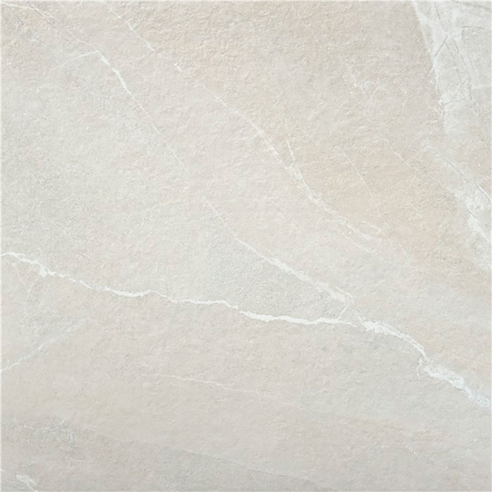 Azulejo cerámico beige con vetas blancas y acabado mate