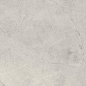 Baldosa gris claro efecto hormigón con vetas sutiles y acabado mate