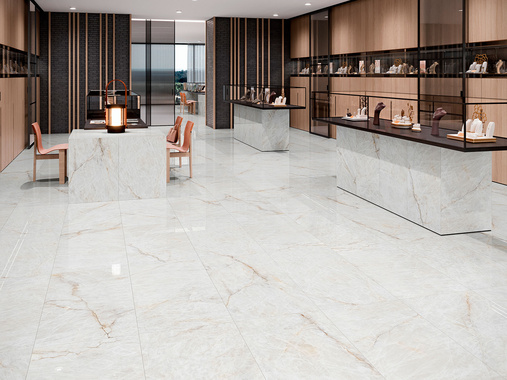 Tienda de azulejos con suelo y mostradores de porcelánico blanco veteado