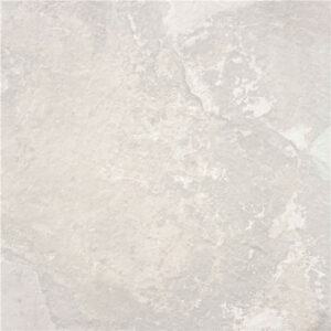 Baldosa cerámica mate color crema con vetas y textura de piedra natural