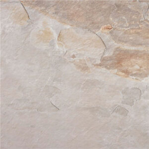 Baldosa efecto piedra beige con vetas tostadas y textura irregular mate