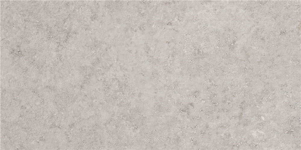 Baldosa cerámica gris claro efecto hormigón con textura mate