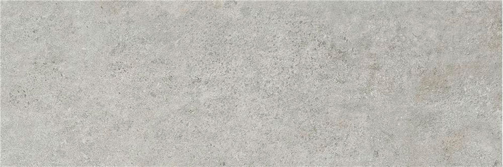 Baldosa cerámica gris efecto hormigón mate con textura sutil