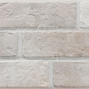 Azulejos rectangulares efecto piedra en tonos beige y crema