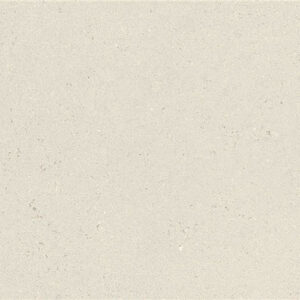 Azulejo cerámico beige claro con textura sutil y pequeñas motas