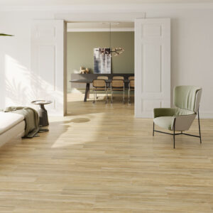 Espacio abierto con pavimento cerámico efecto madera roble claro y mobiliario minimalista