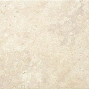 Baldosa cerámica crema efecto piedra con textura y vetas naturales