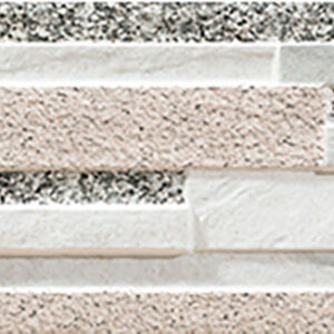 Revestimiento cerámico rectangular en relieve con tonos crema, blanco y gris.