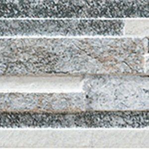 Revestimiento cerámico de lamas en tonos gris y beige con textura estratificada