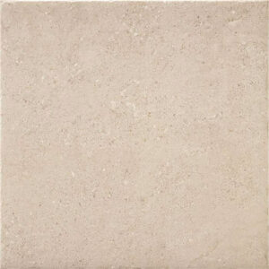 Baldosa cerámica cuadrada beige efecto piedra con textura mate y motas sutiles