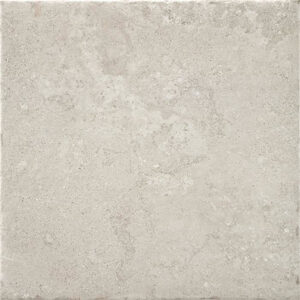 Azulejo cerámico cuadrado beige claro con textura de piedra y acabado mate