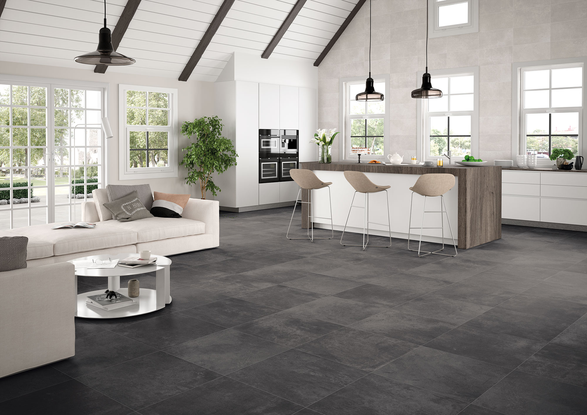 Suelo cerámico gris oscuro en losas grandes de salón-cocina moderno