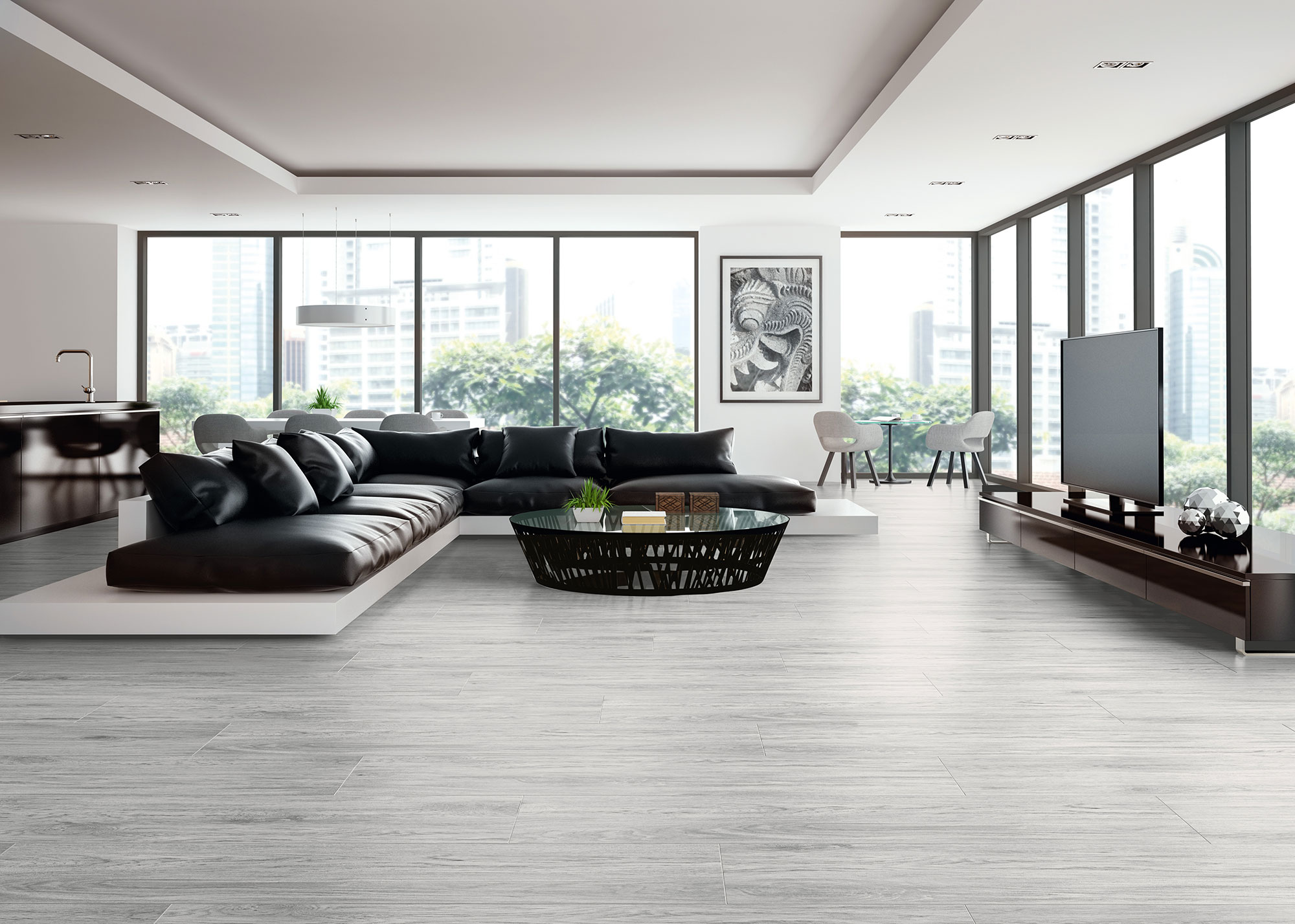 Salón showroom con sofá negro y pavimento cerámico efecto madera gris