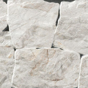 Azulejos efecto piedra blanca irregular con juntas grises