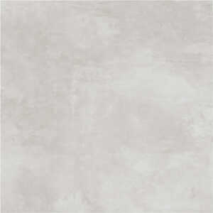 Baldosa cerámica gris claro efecto hormigón con textura mate y vetas suaves