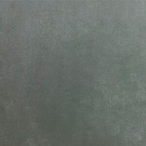 Azulejo cerámico gris antracita con textura mate y aspecto envejecido