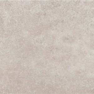 Baldosa cerámica tono beige rosado con textura efecto cemento