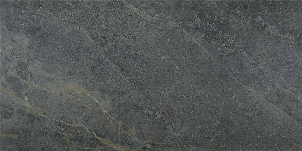 Azulejo cerámico efecto piedra gris oscuro con finas vetas beige y textura mate