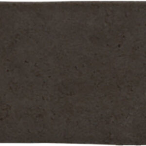 Azulejo cerámico alargado gris oscuro con brillo y manchas blancas irregulares