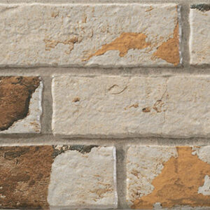 Old-Caravista-Ocre-17x52 Revestimiento cerámico tipo ladrillo beige-marrón con textura envejecida y desconchado