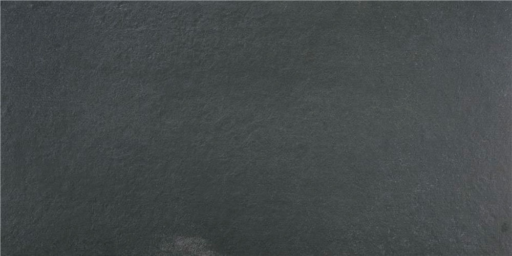 Baldosa cerámica efecto pizarra gris oscuro con textura sutil