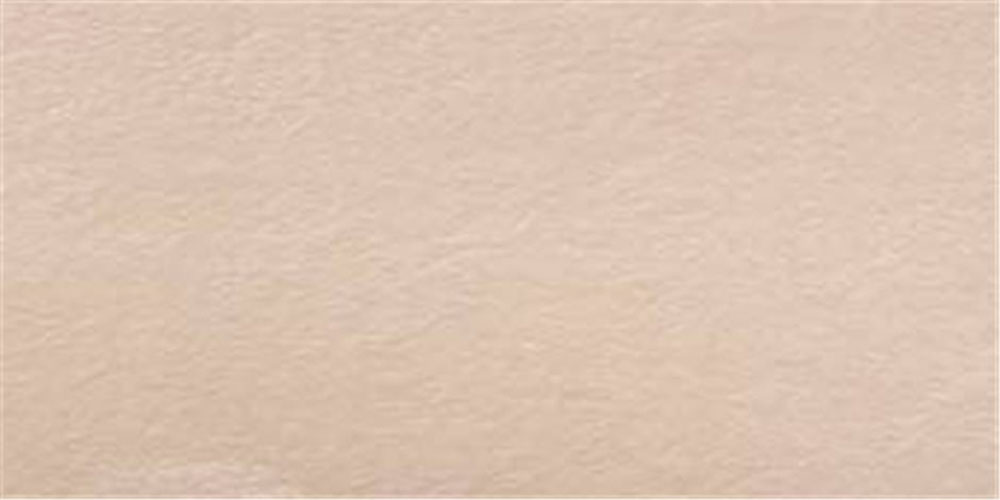 Azulejo cerámico beige claro con textura rugosa y acabado mate