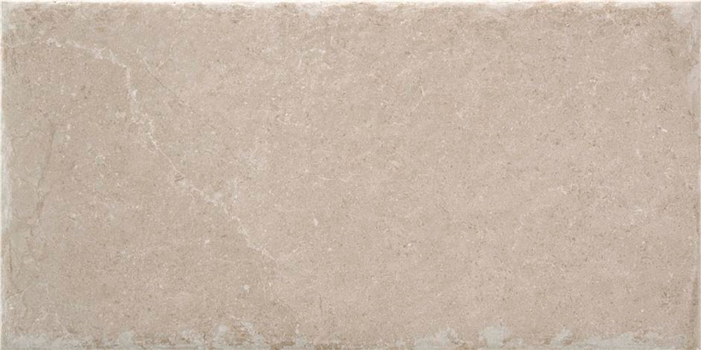 Azulejo rectangular beige efecto piedra con vetas suaves y bordes desgastados