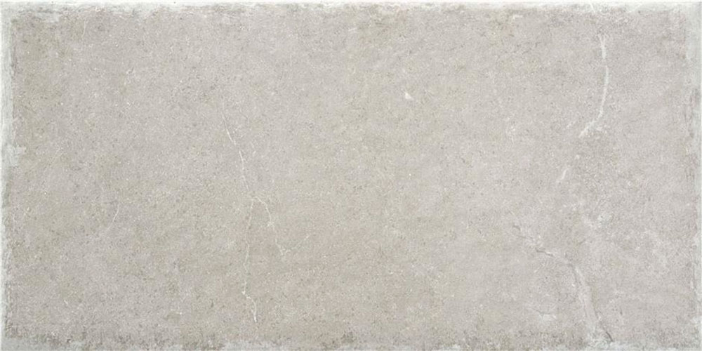 Azulejo cerámico gris claro efecto piedra con vetas sutiles