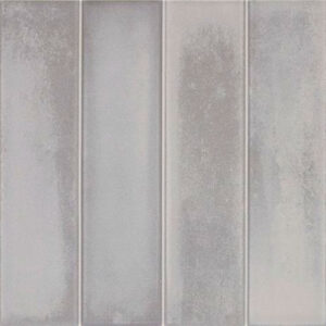 Azulejos rectangulares grises con textura mate y juntas verticales