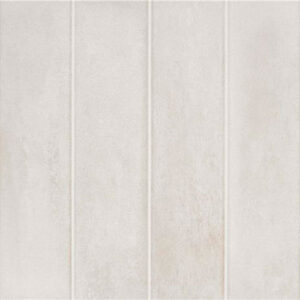 Revestimiento cerámico en listones verticales color beige claro con textura sutil