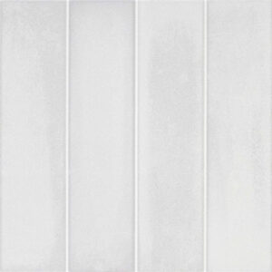 Azulejos rectangulares blancos con textura mate y juntas verticales