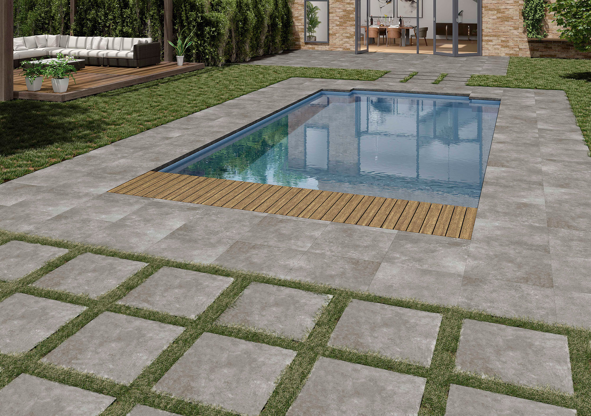 Piscina rectangular con pavimento cerámico gris, bandas de césped y listón de madera
