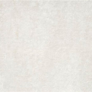 Baldosa cerámica rectificada color crema textura mate y sutil efecto piedra