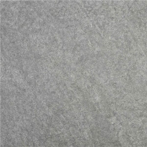 Baldosa cerámica gris con textura rugosa tipo pizarra