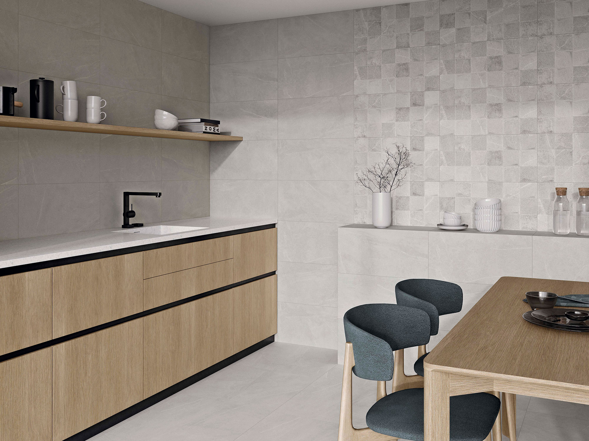 STN-AMB-BELLEVUE-GREY_WHITE-30x60 Cocina expositora con azulejos grises, panel mosaico, encimera blanca y muebles de madera.