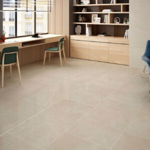 STN-AMB-BELLEVUE-IVORY-PULIDO-60X120 Showroom de azulejos con suelo cerámico beige efecto piedra y mobiliario contemporáneo