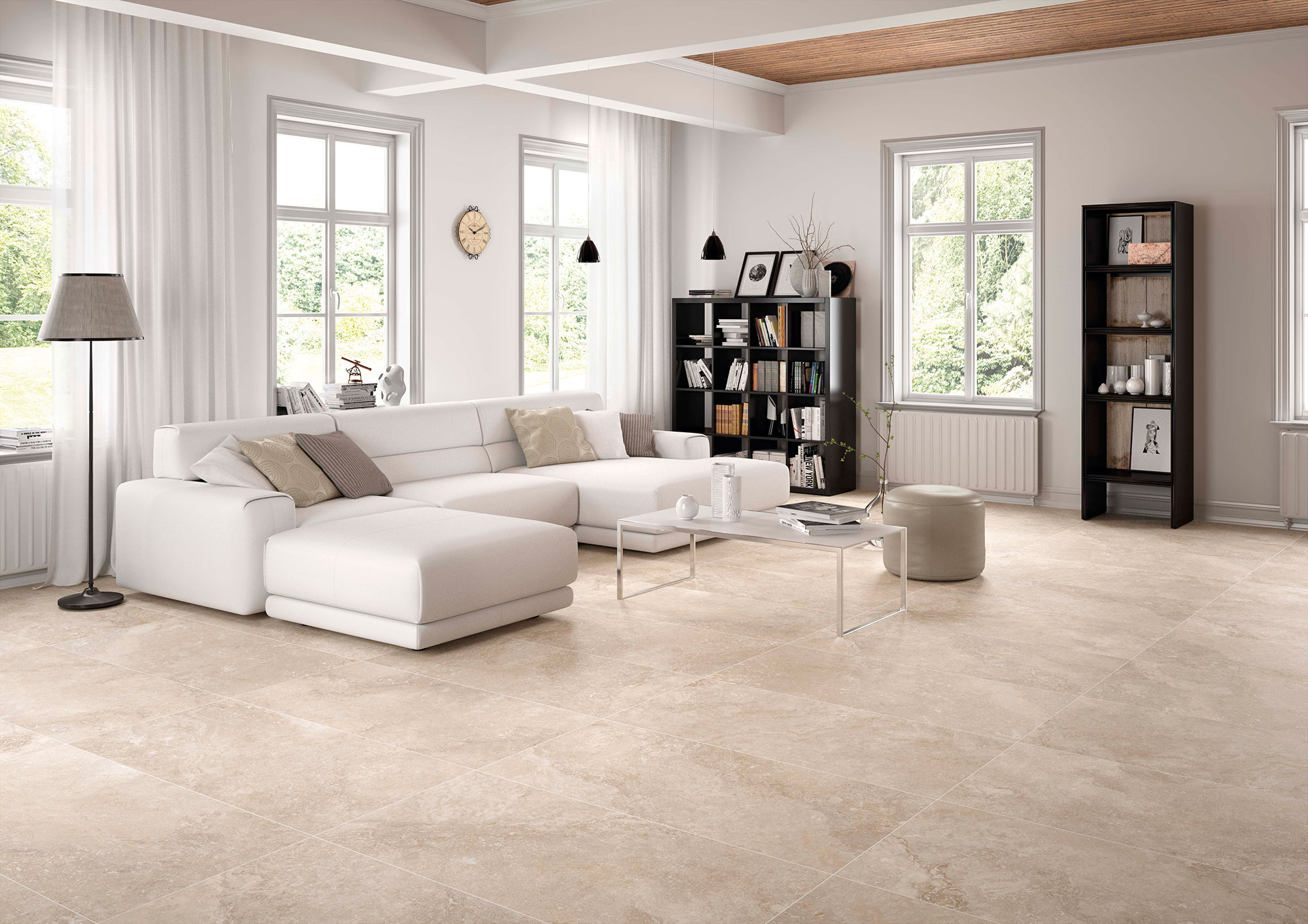 STN-AMB-ROCKSTONE-BEIGE-60x120-RGB Salón de exposición con sofá blanco y pavimento cerámico formato grande beige