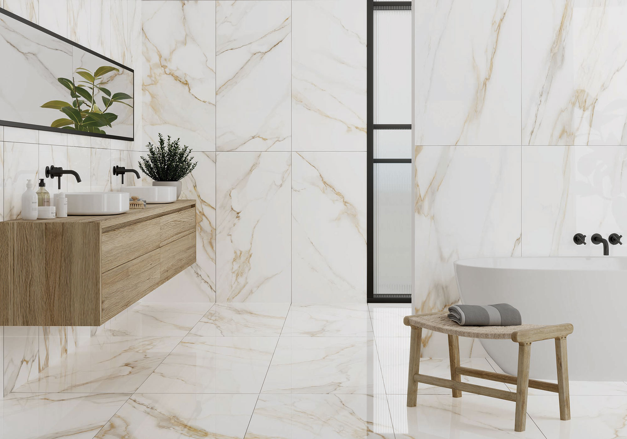 Baño de exhibición con grandes azulejos efecto mármol, lavabo doble flotante y bañera.