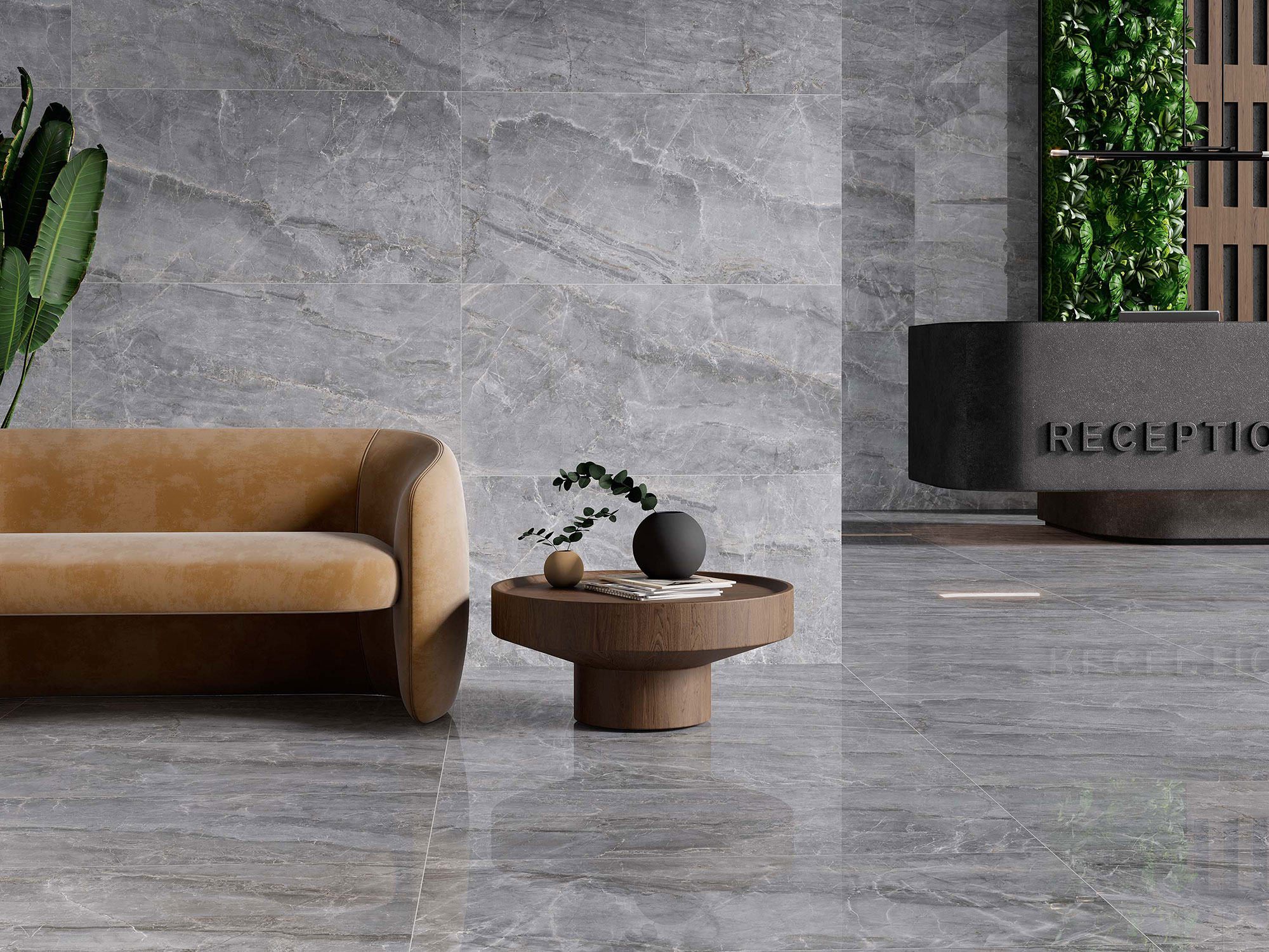 Showroom con azulejos grises efecto mármol, sofá camel, mesa de madera y recepción vegetal