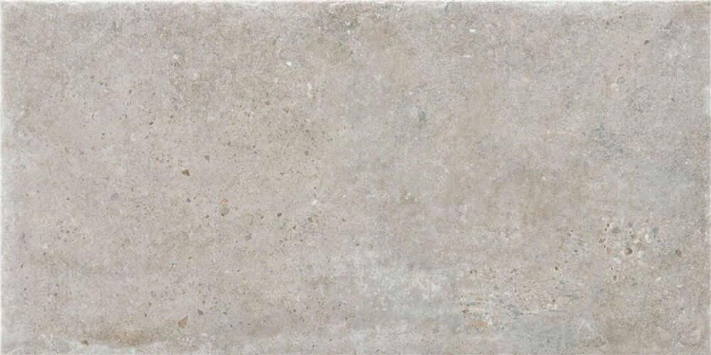Saint-andrews-gris-30x60 Azulejo rectangular efecto hormigón gris claro con poros y moteado sutil